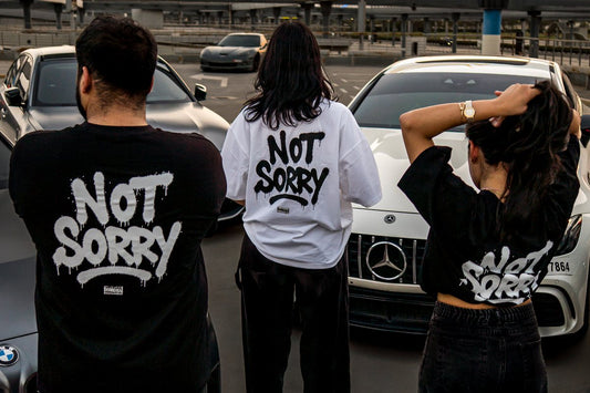 Two NOT SORRY tees and shorts bundle
